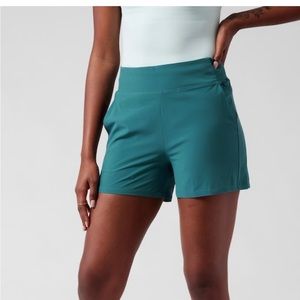 Athleta Brooklyn shorts washed and never worn size 4 teal